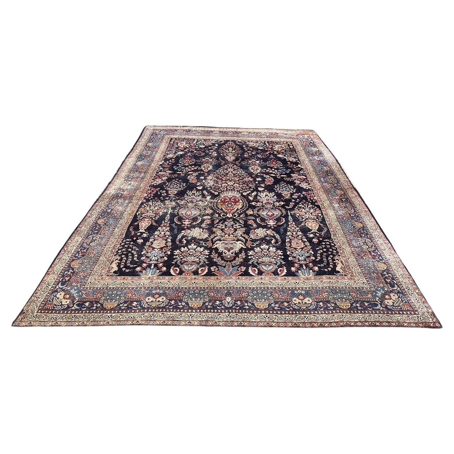 Antique Persian Kashan rug with central medallion design