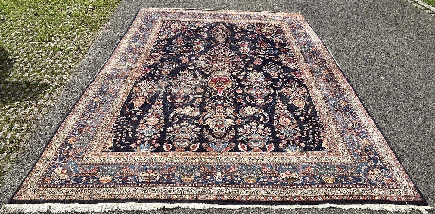 Persian rug in soft red and floral design