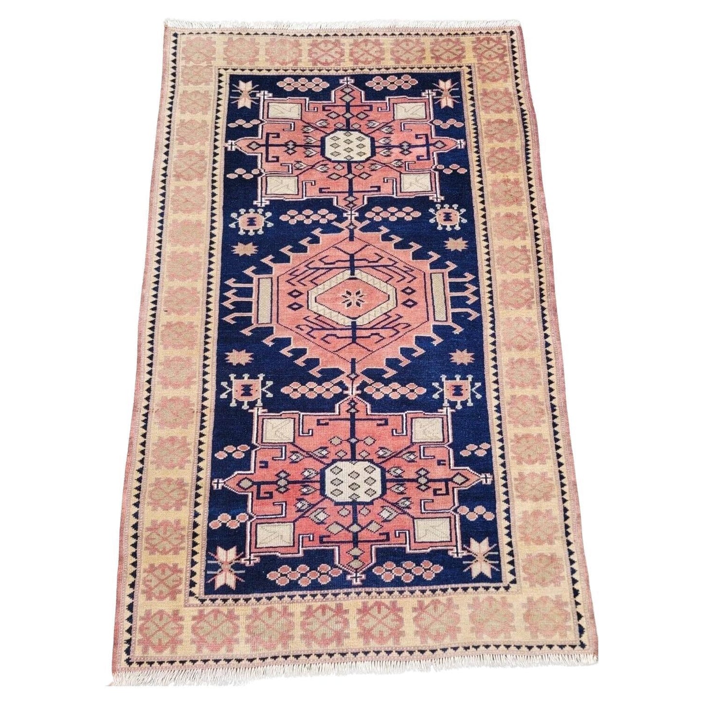 Handmade vintage Turkish Kars rug in muted pink and blue