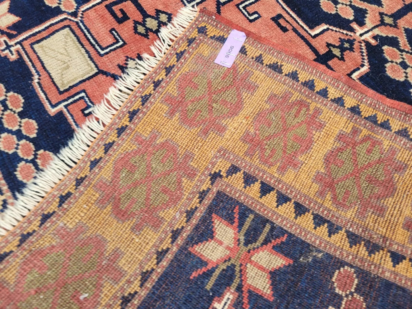 Close-up of pastel motifs on Kars rug