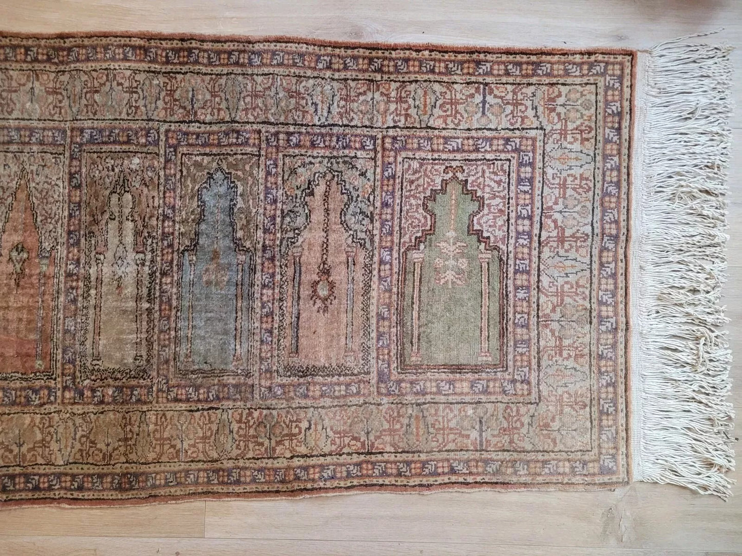 1950s silk rug with multi-mihrab prayer niche design