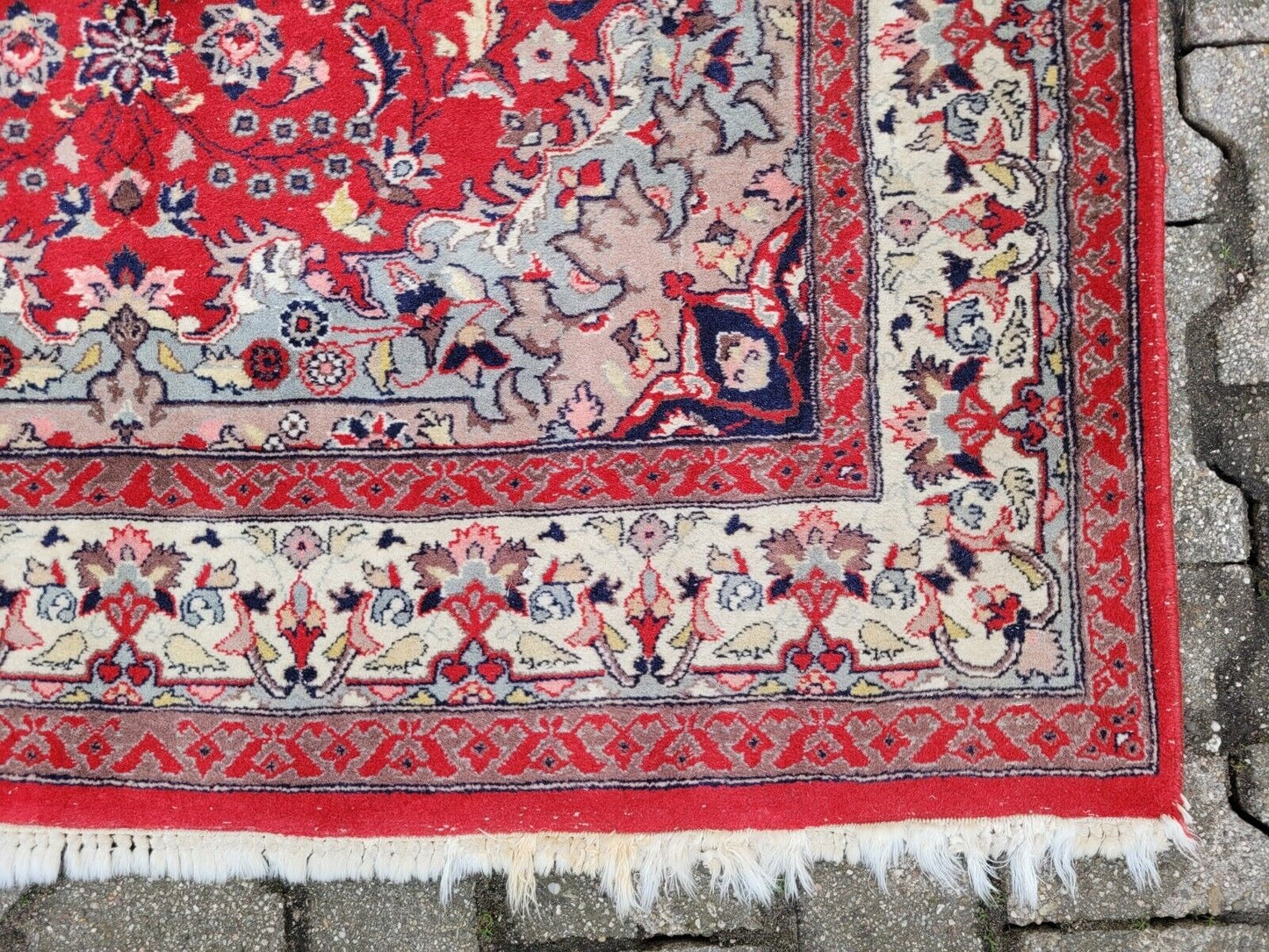 High-quality wool pile with vibrant color retention.