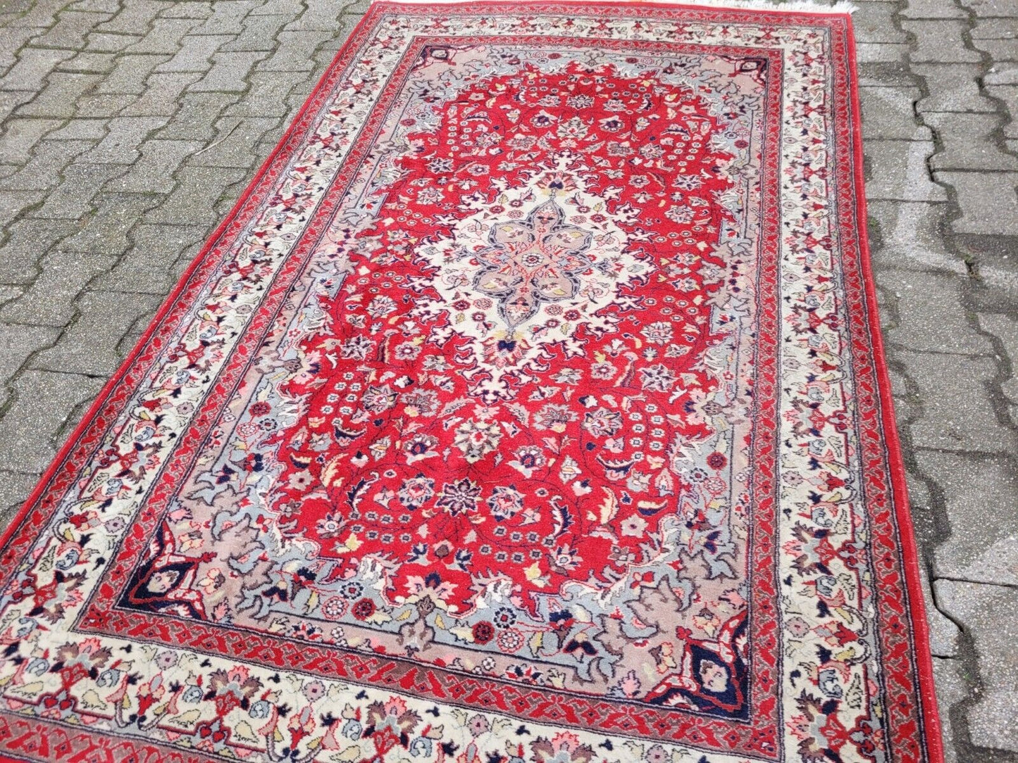 A vintage Persian rug with a traditional look.