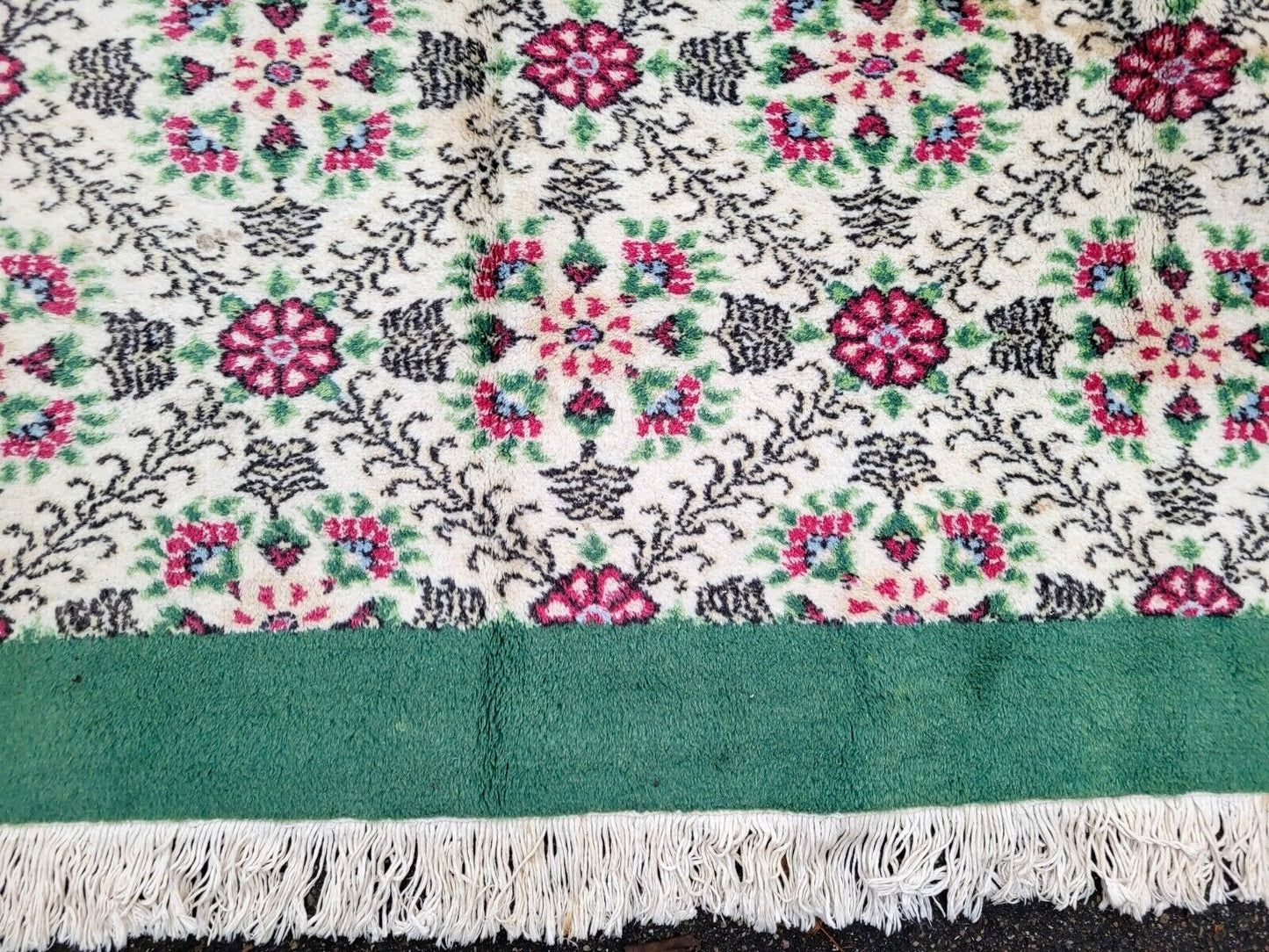 Close-up of the intricate floral and foliage details.