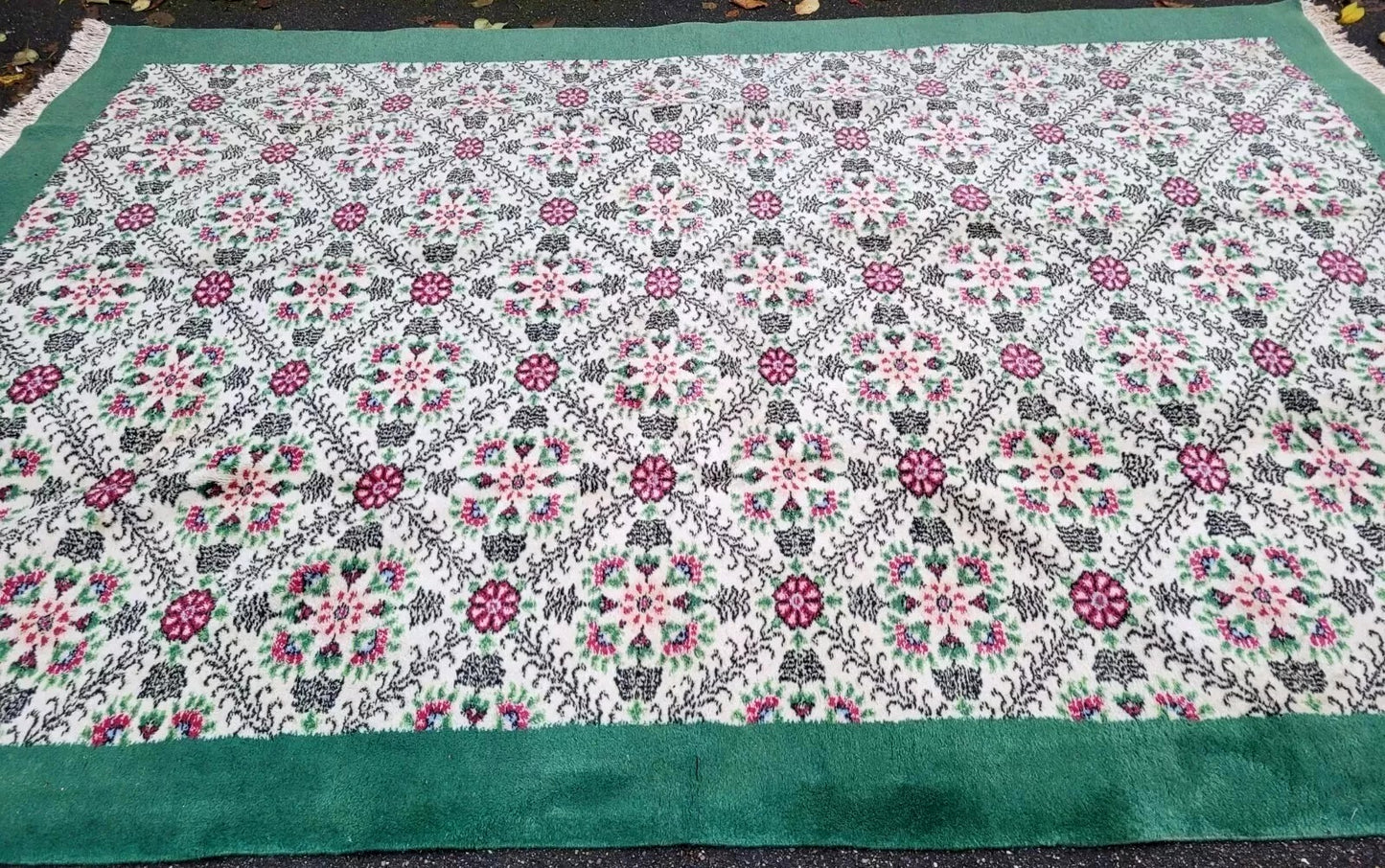 Vintage floral rug with a soft and inviting color palette.