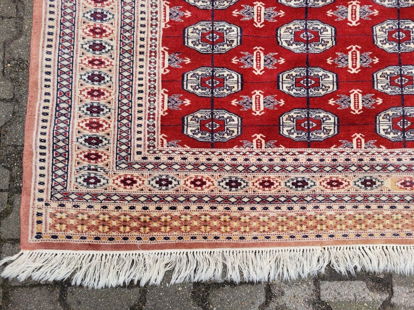 Stylized motif pattern on small Uzbek rug
