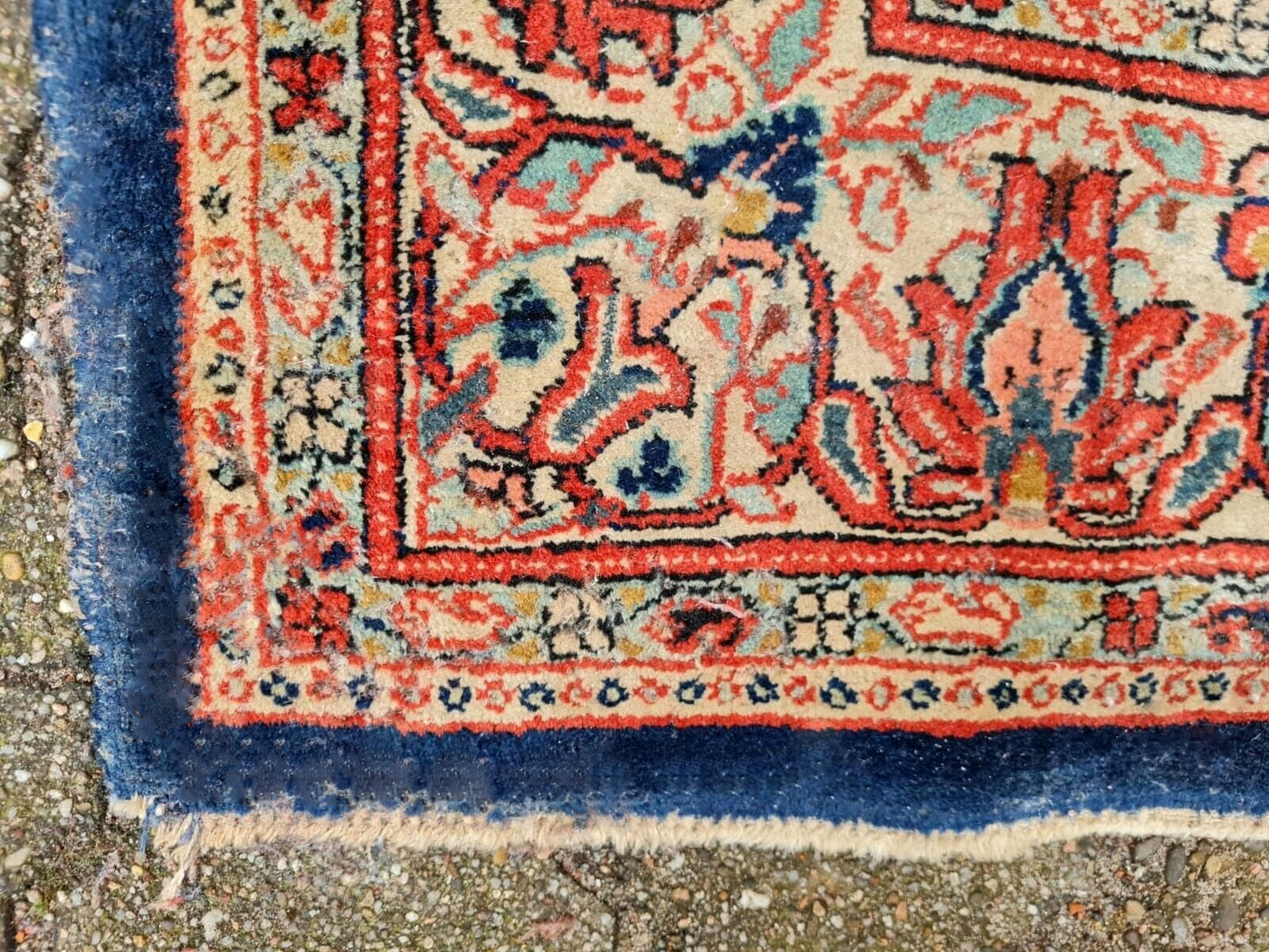 Corner border with cream and blue floral motifs