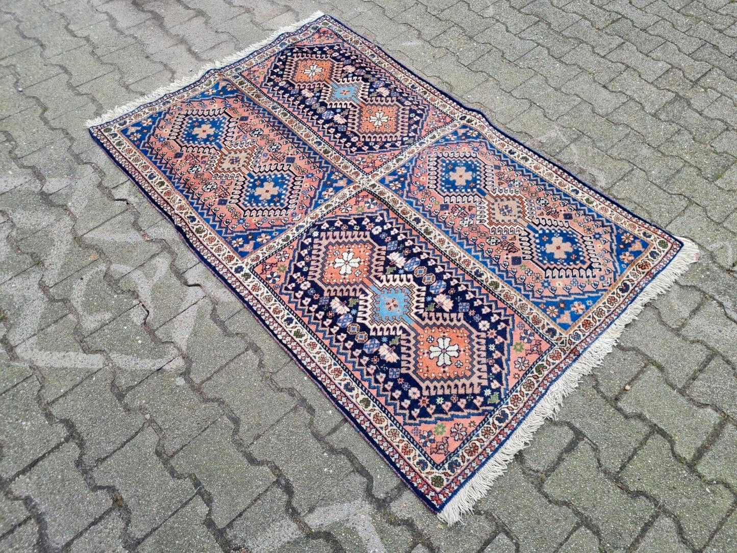 Central medallion detail on Persian Luri carpet