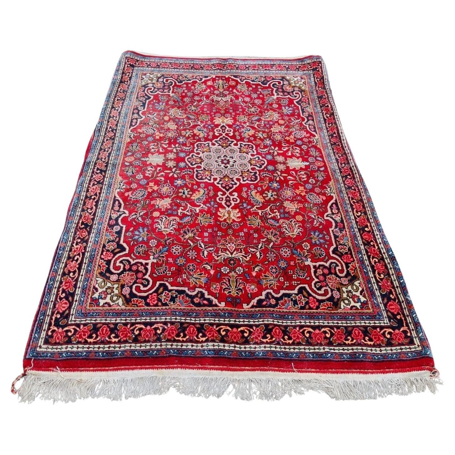 Vintage Persian Bidjar rug with red field and central medallion