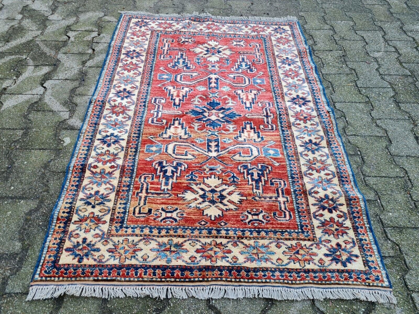 Hand-knotted wool Kazak rug close-up