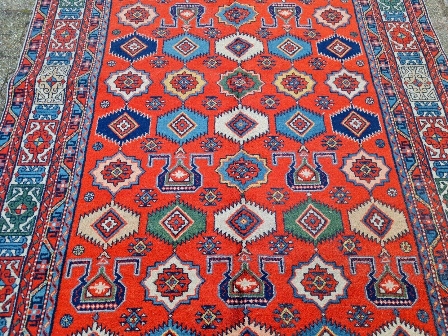 traditional border motifs of vintage Caucasian Kazak carpet