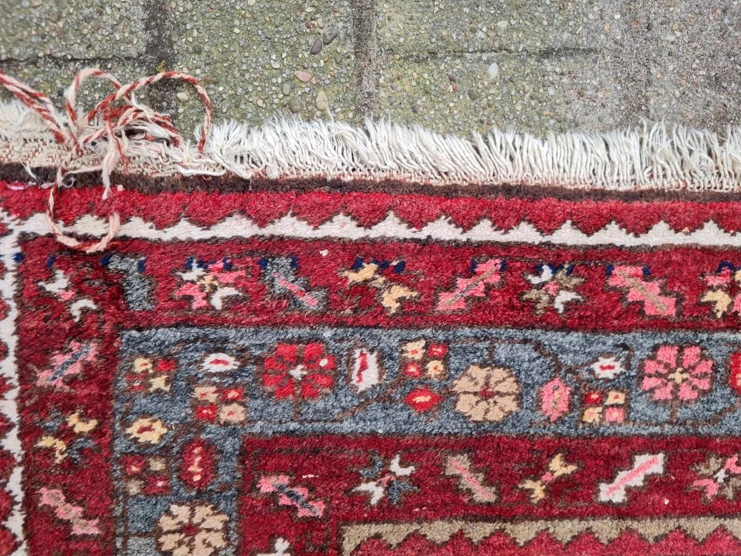 close-up of 1920s Hamadan rug central medallions