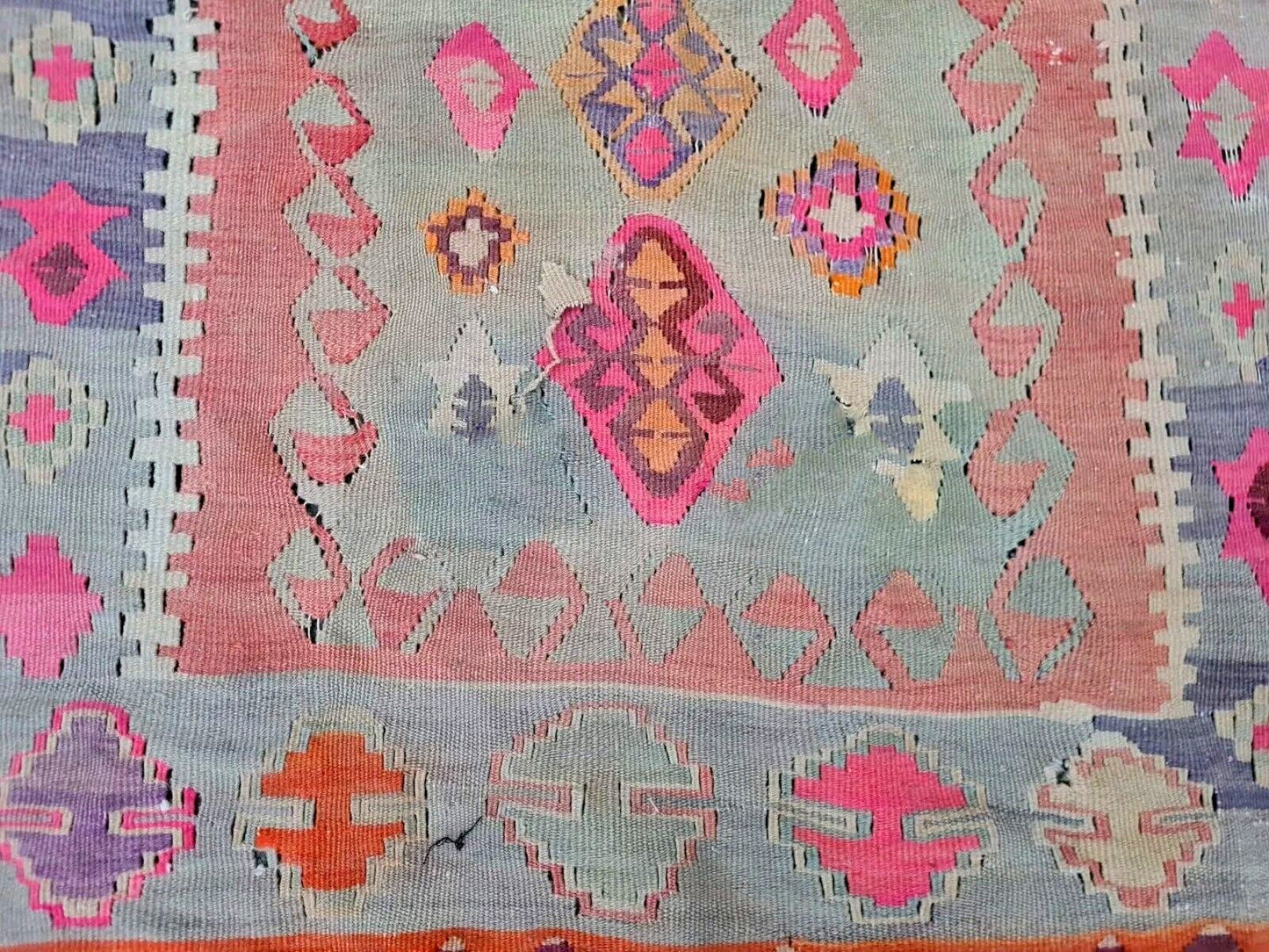 Edge and corner of Turkish kilim showing flatweave texture