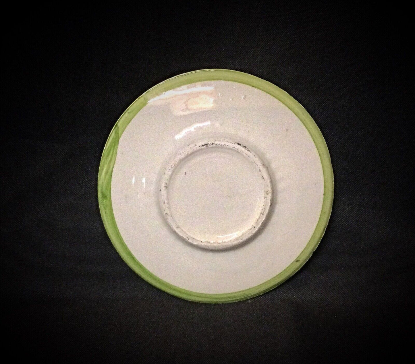 Close-Up of Multicolor Ceramic Vide-Poche Featuring Olive Pattern