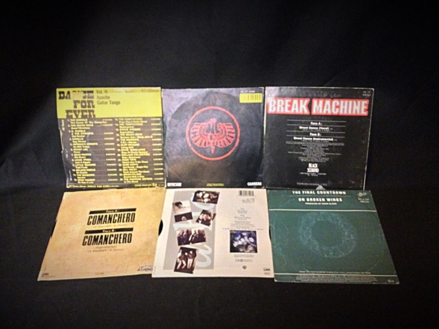 Break Machine vinyl record included in the lot of vintage 45 RPM records.