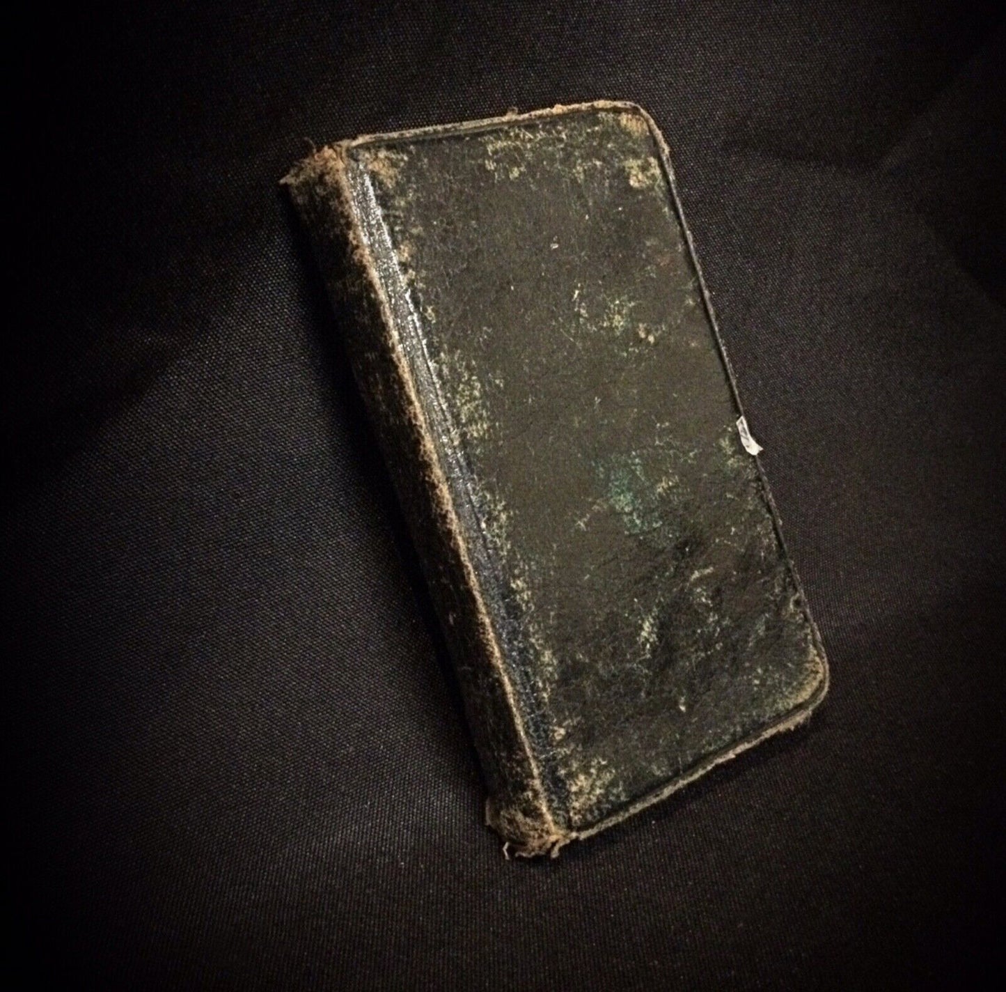 Close-up of the pages inside the antique Roman Missal book, highlighting the text.