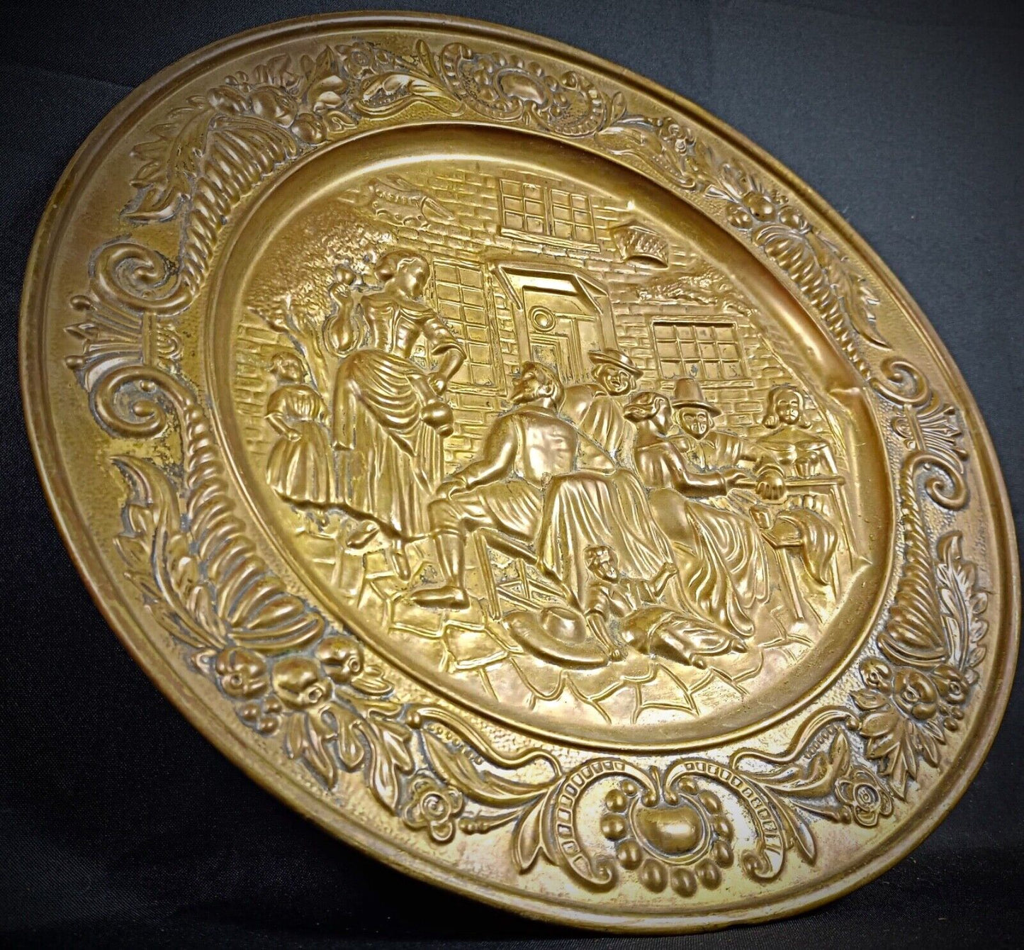 Vintage decorative brass plate — early 20th-century design