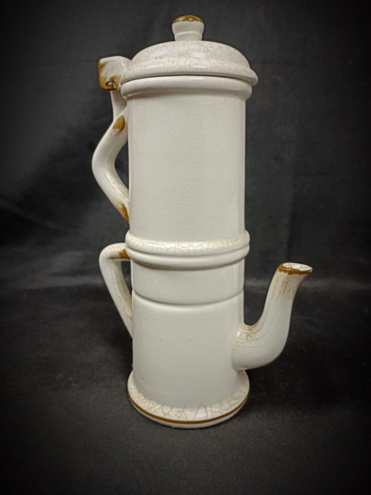 Close-up of baroque-style detailing on ceramic surface