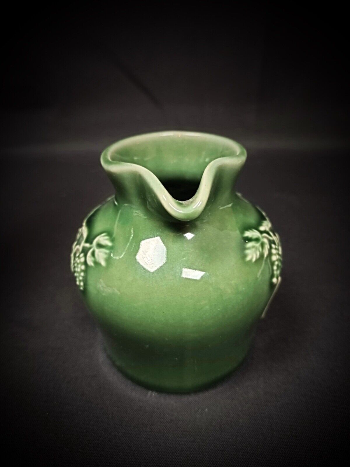 Mid-century decorative pitcher with vine leaves