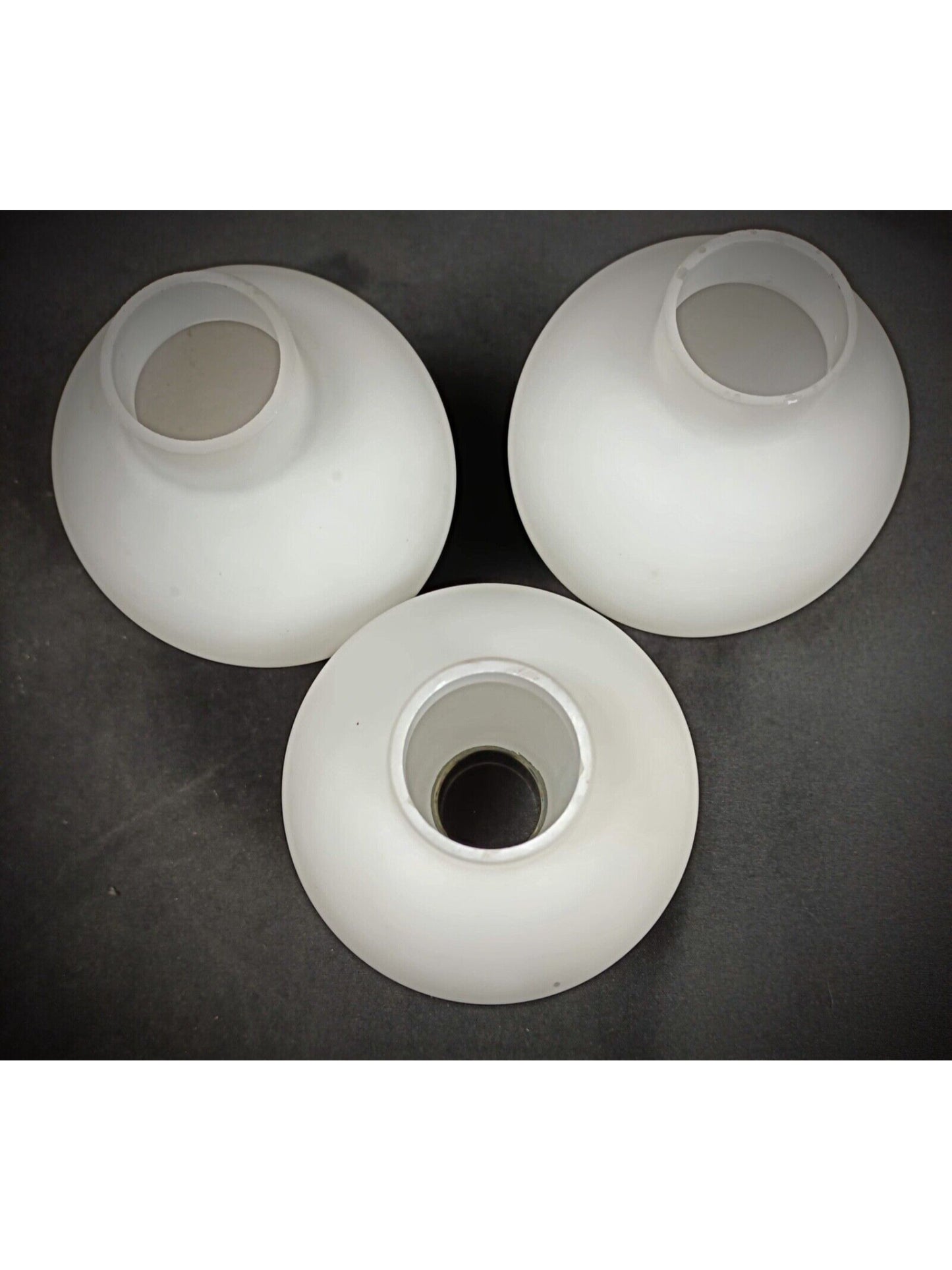 Close-up of smooth white opaline globe surface