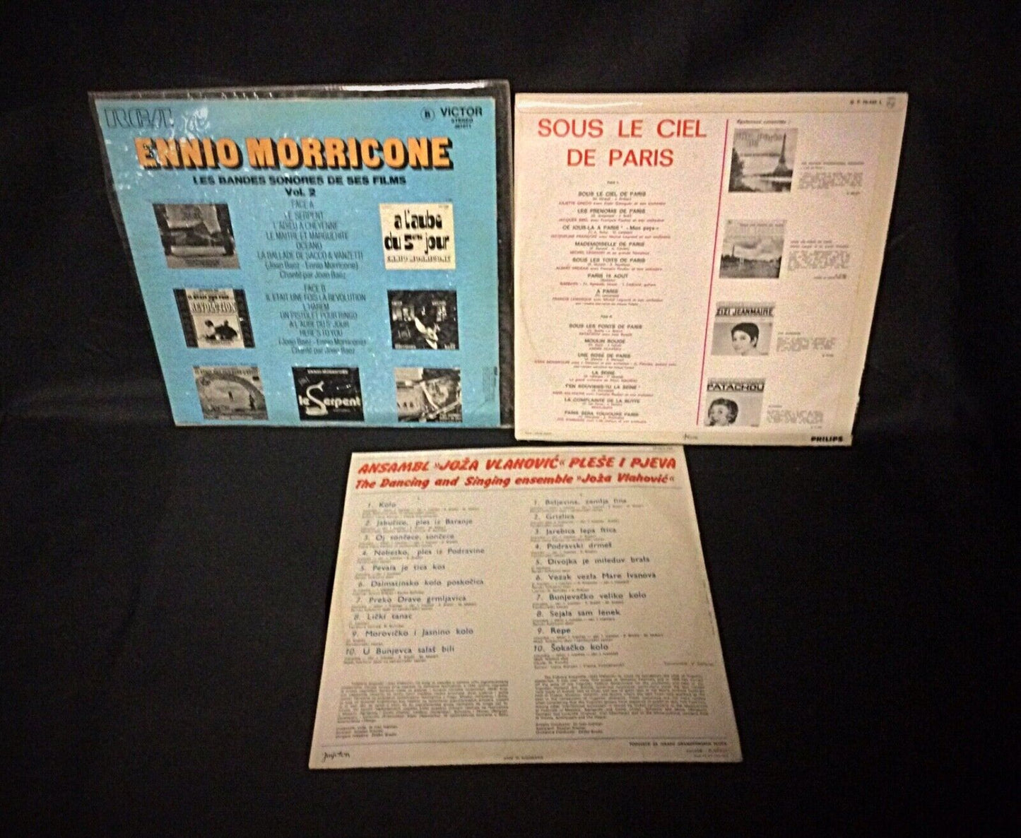 Back view of vinyl records showing condition and detailed album covers.