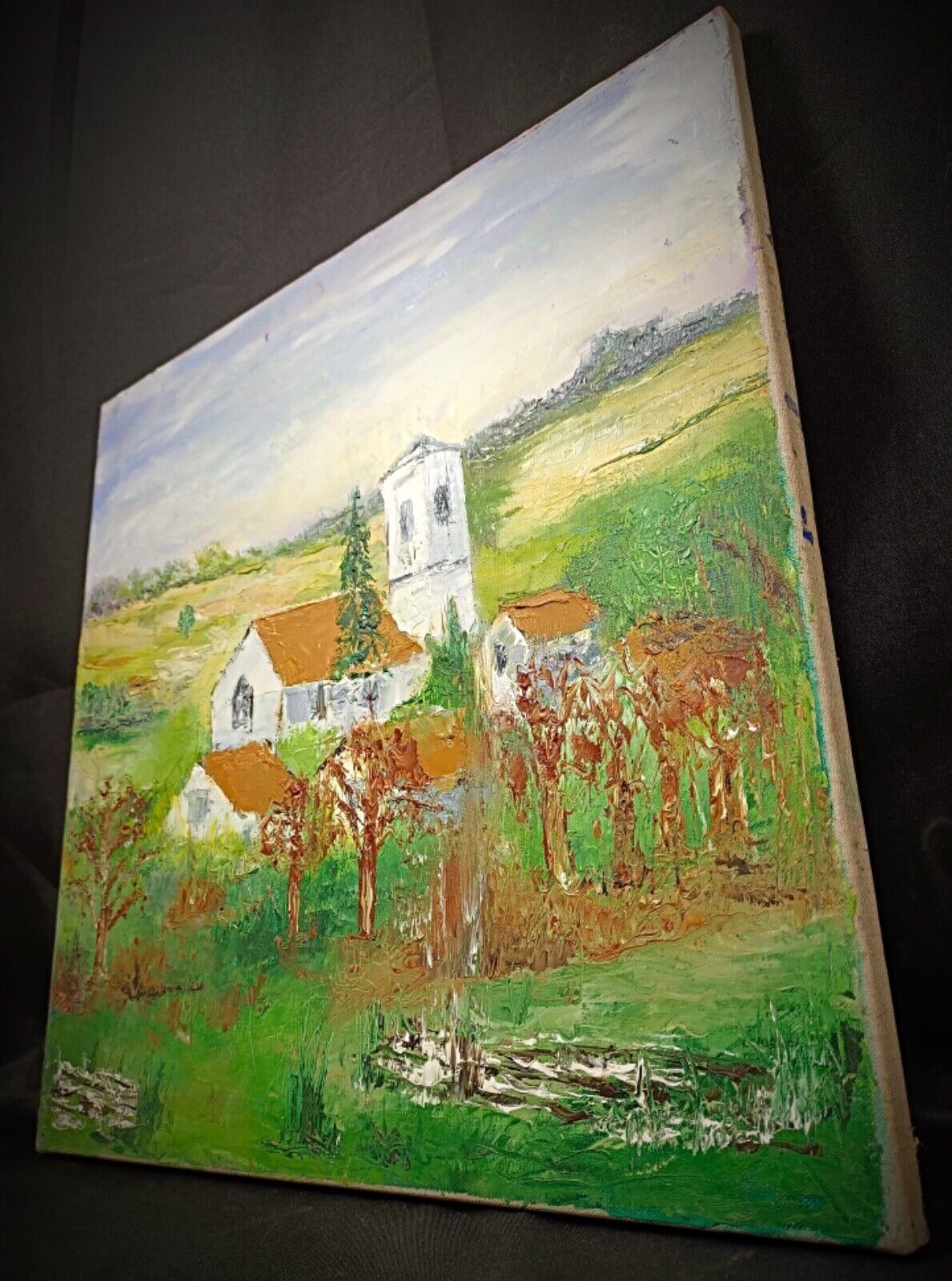 Close-up of the village church scene in oil painting
