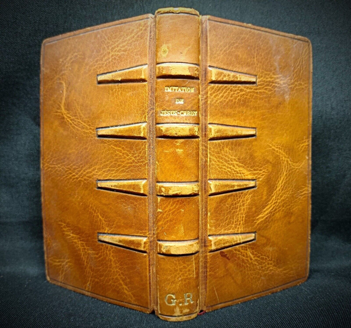 Open page showing yellowed devotional text and soft patina