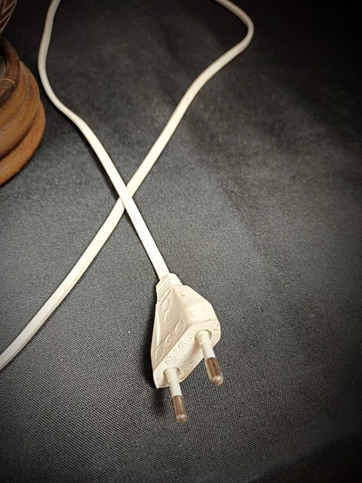 Lampshade fabric showing frayed seam detail