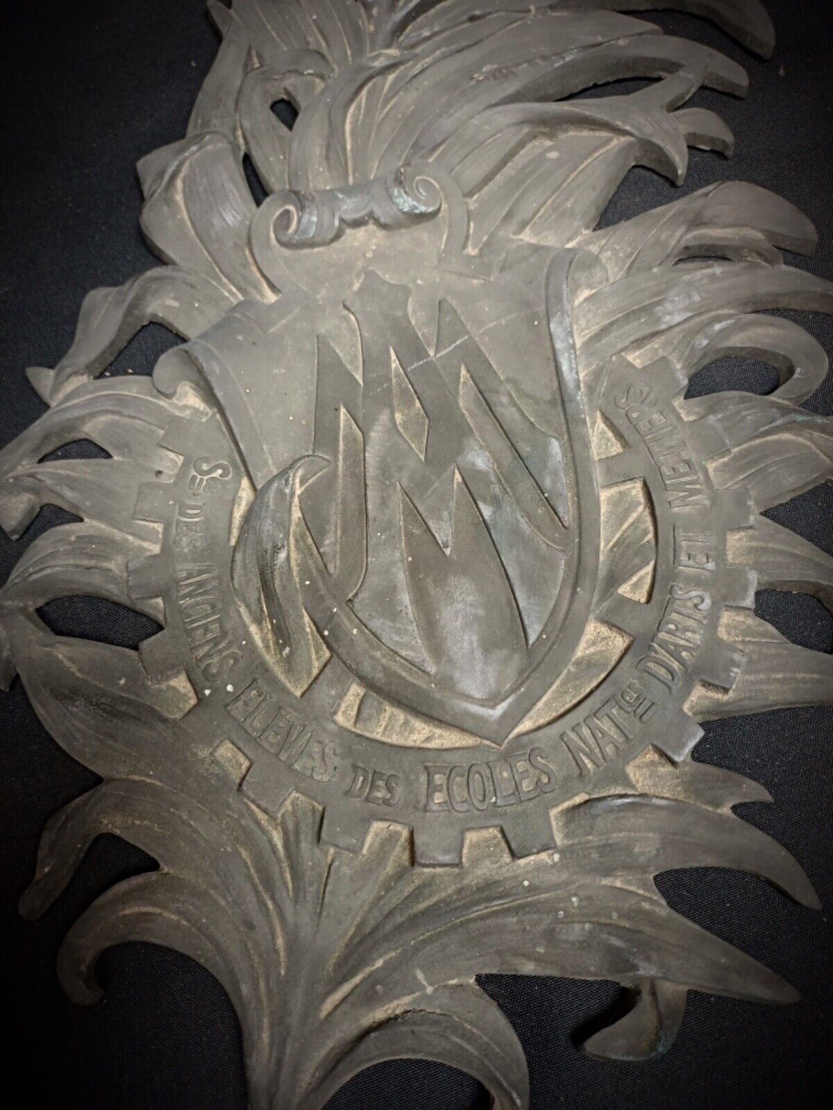 Close-up showing Empire-style relief details