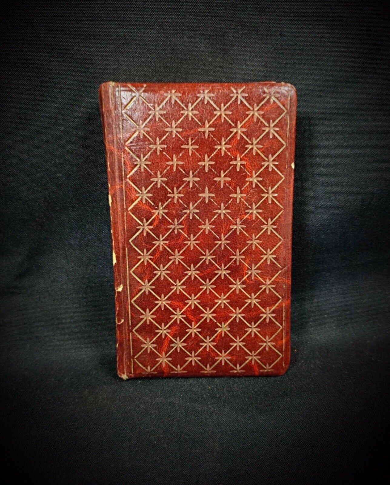 Hardcover binding detail in ambient lighting