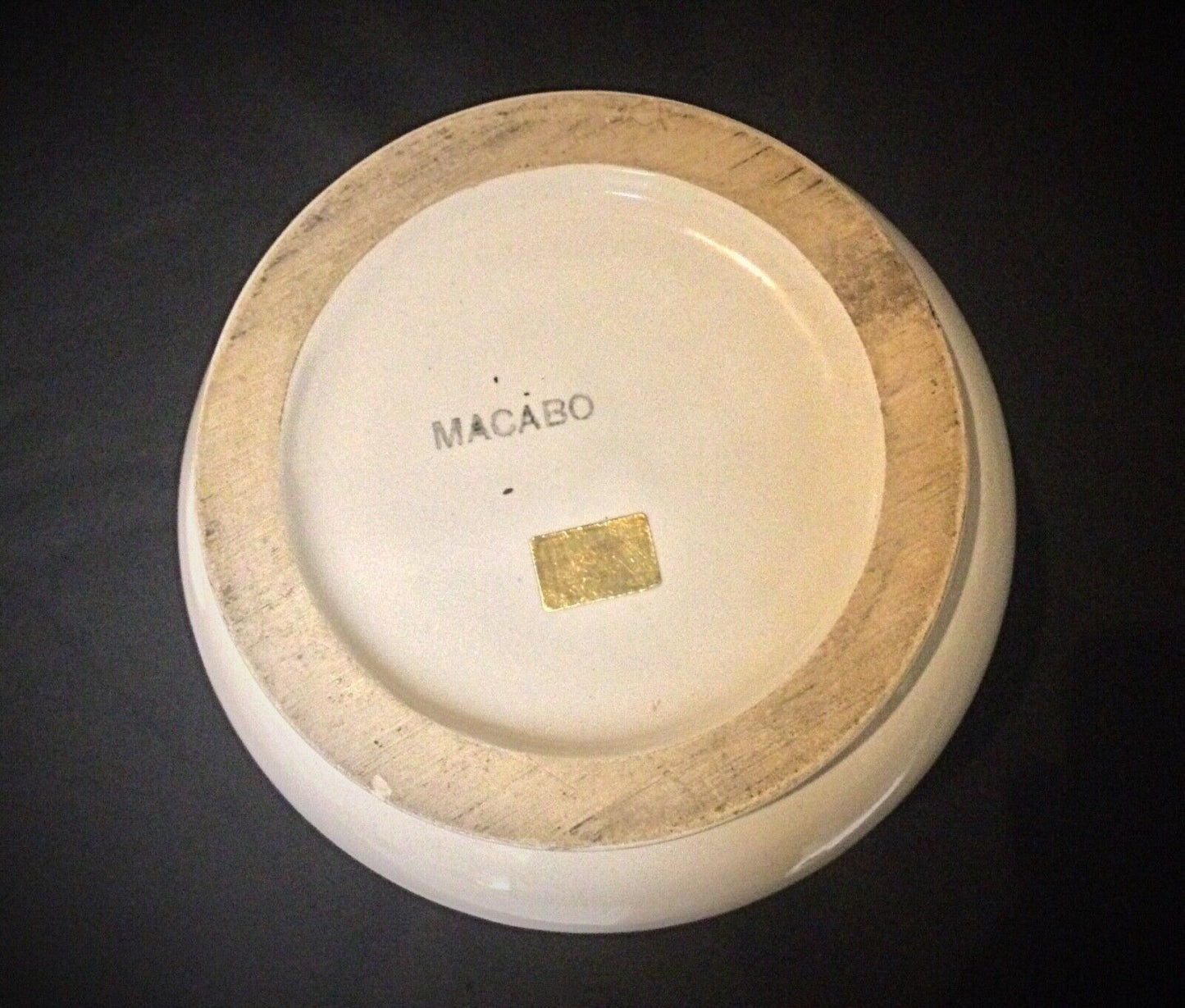 Detailed floral pattern on faience urn