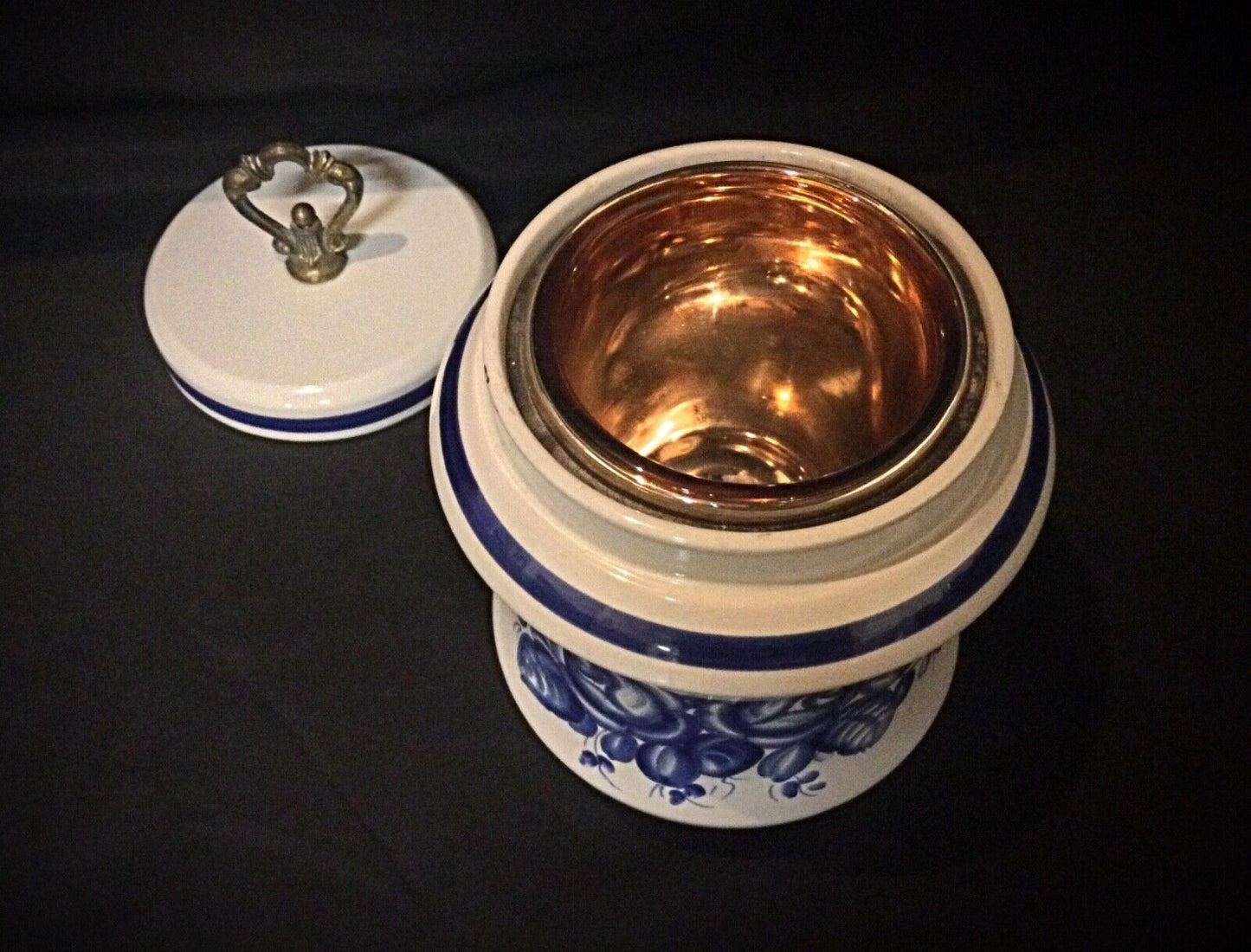 Elegant faience urn with blue floral decor
