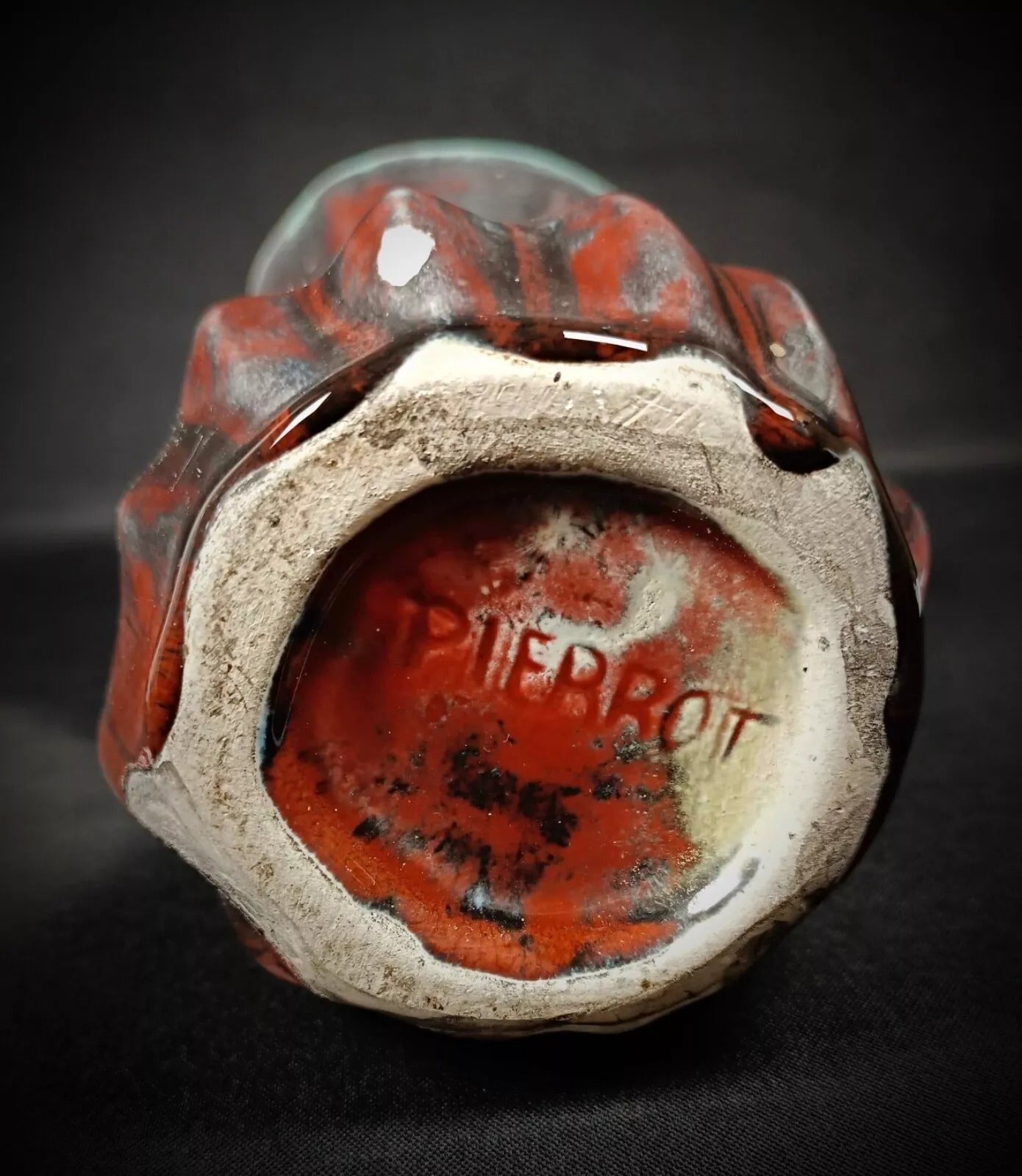 Minor chips near bottom showing vintage use