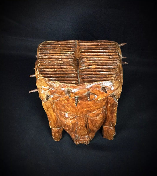 Detailed facial features showing suffering expression