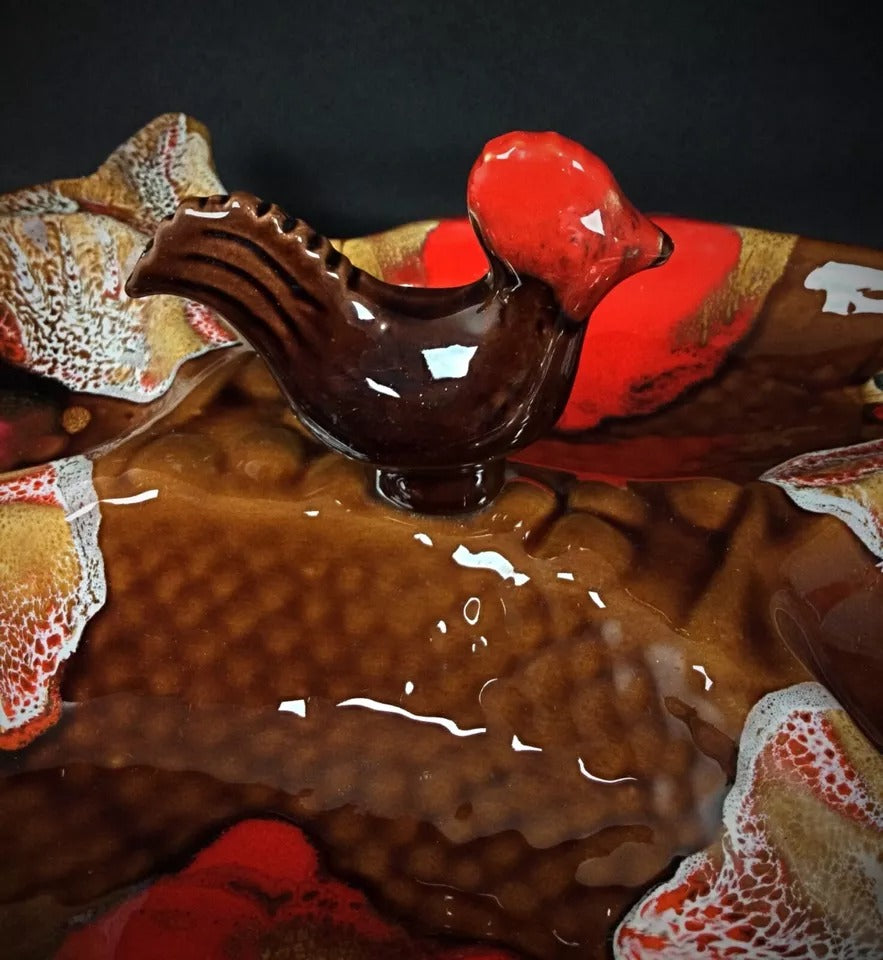 The dish displayed in a table setting with appetizers