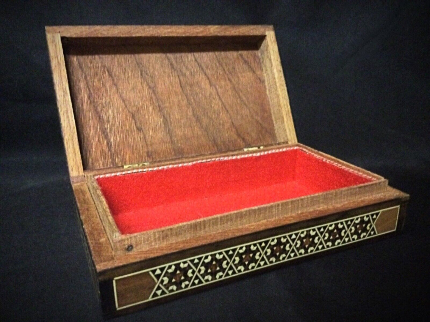 Bottom of the box, showcasing the solid wood craftsmanship.
