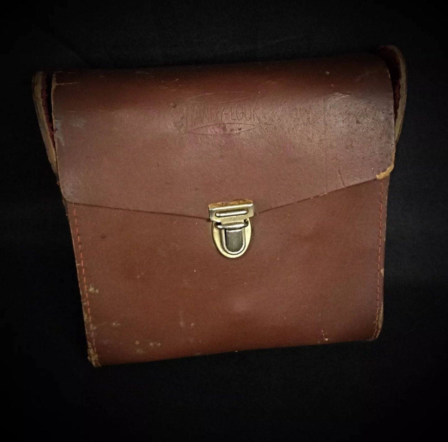 Close crop of spelter corpus and wooden cross intersection with wear visible