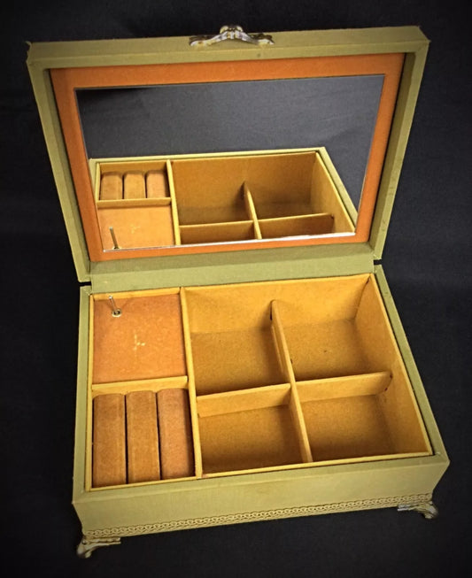 Vintage French style music box with fabric embroidery wood and metal components 8.66 inches long on display