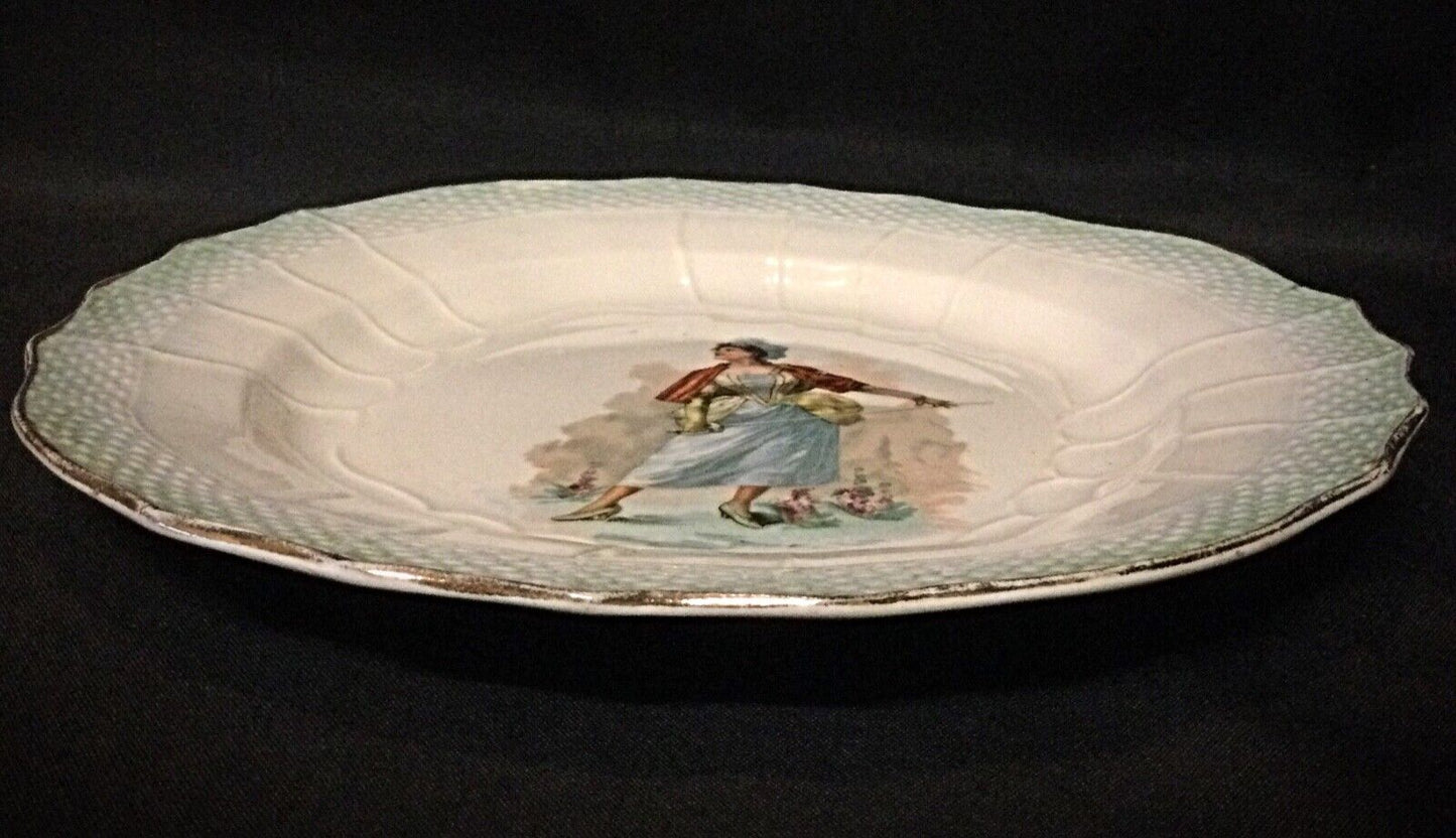 The glazed surface of the French ceramic plate, reflecting fine craftsmanship