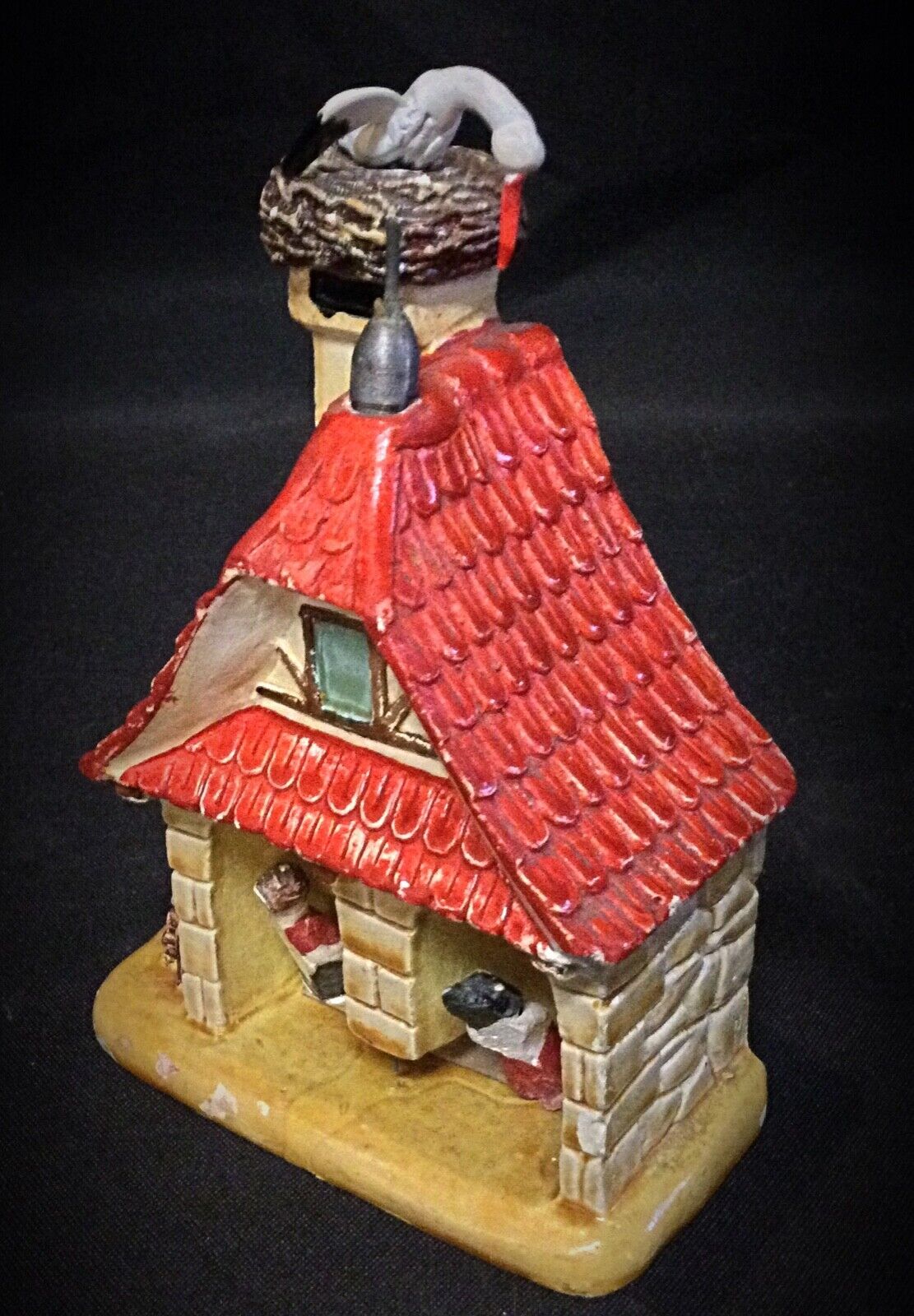 Front view of the plaster house model, showcasing intricate architectural details