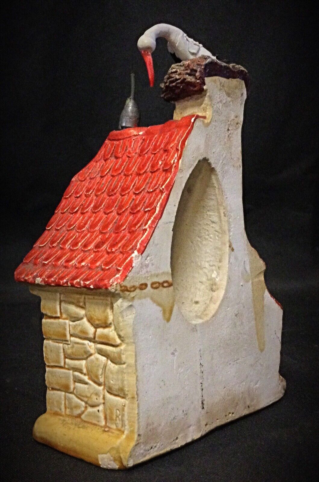 Rear view of the plaster house, highlighting its unique structure