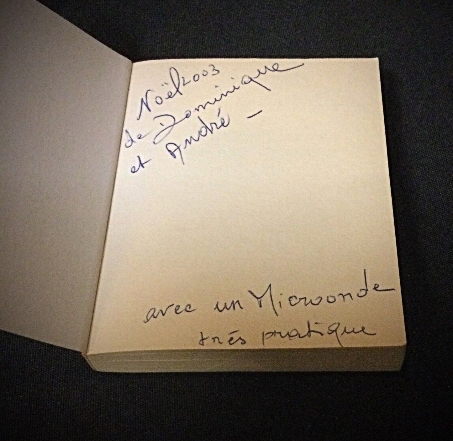 Close-up of the interior pages of "Soliman", showing faded text and vintage wear