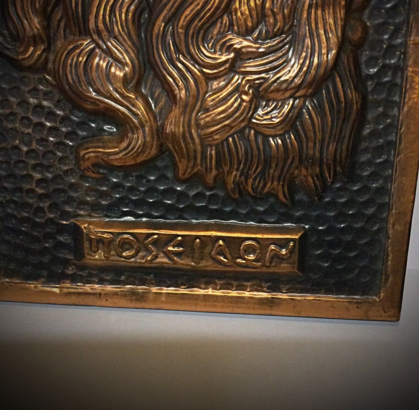 Greek mythology-inspired hammered copper artwork