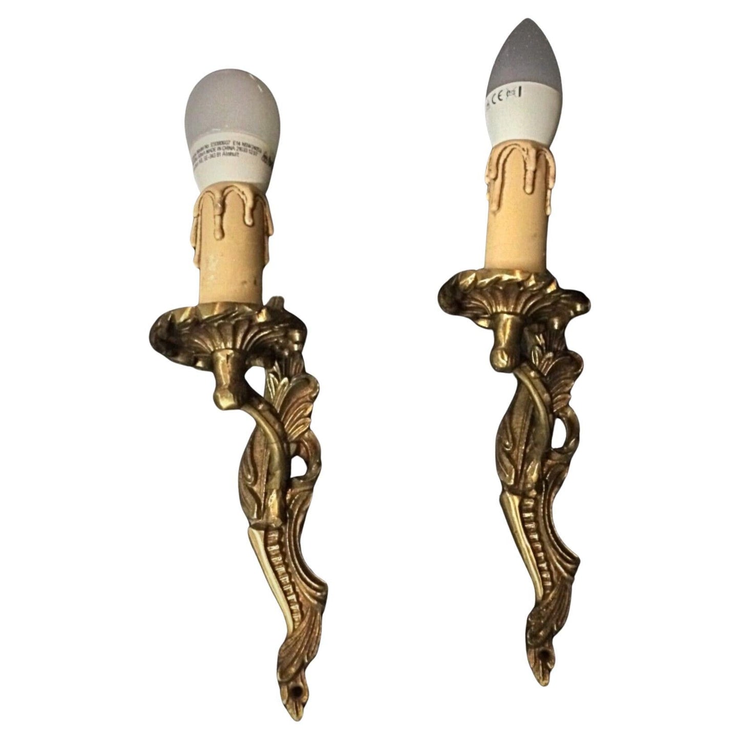 Pair of vintage brass wall sconces with classic ornate design