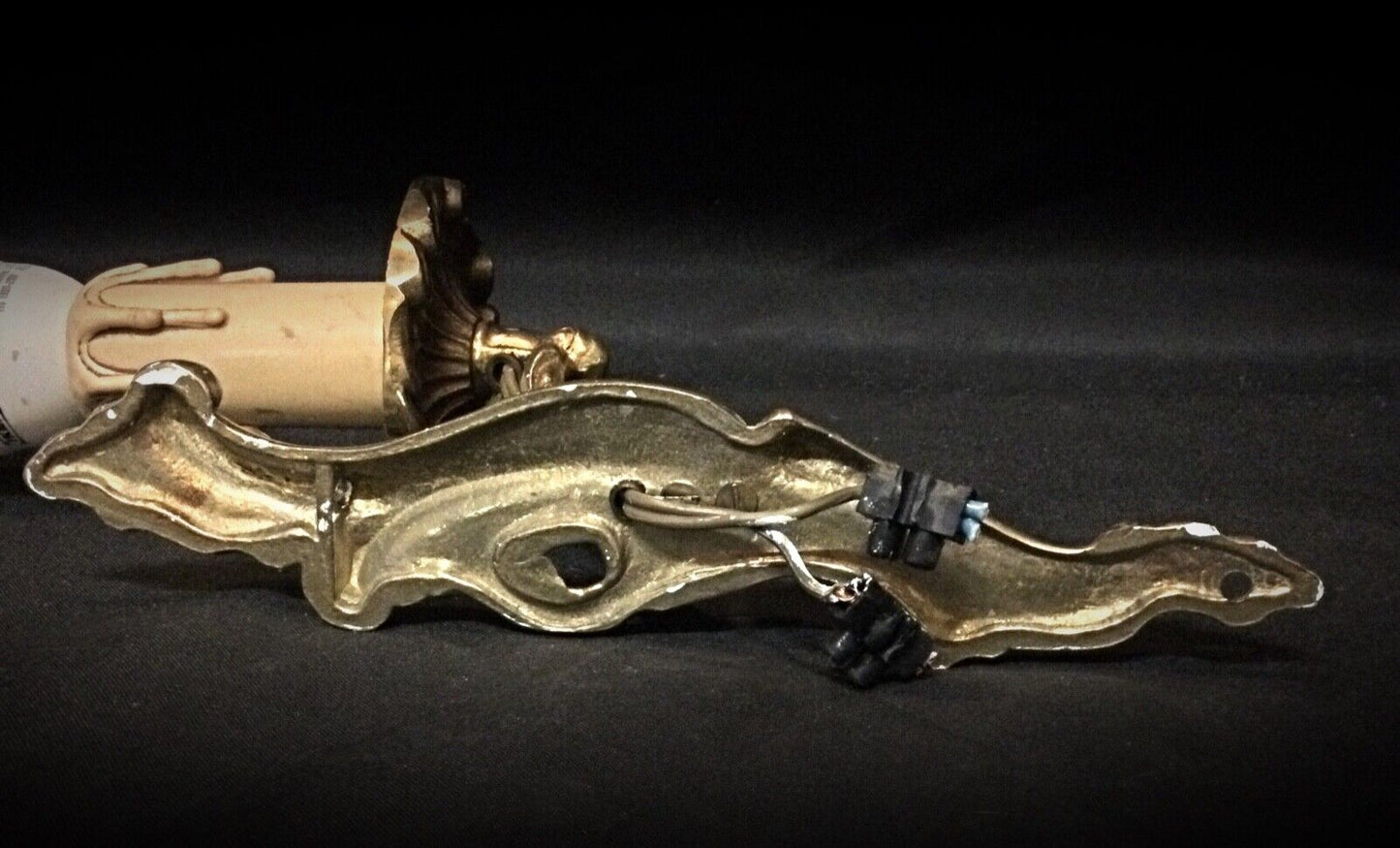 Classic brass sconces with decorative detailing for home dΓ©cor