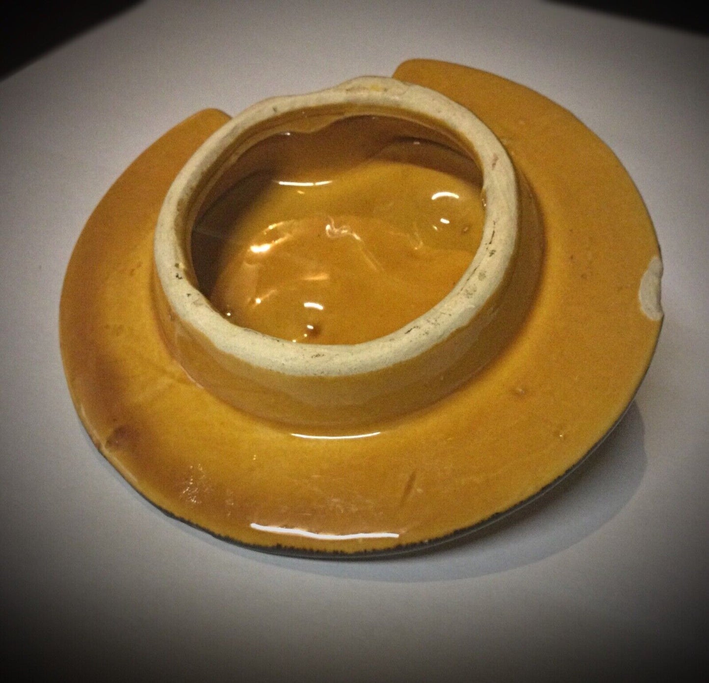 Antique pottery with minor wear and restored areas