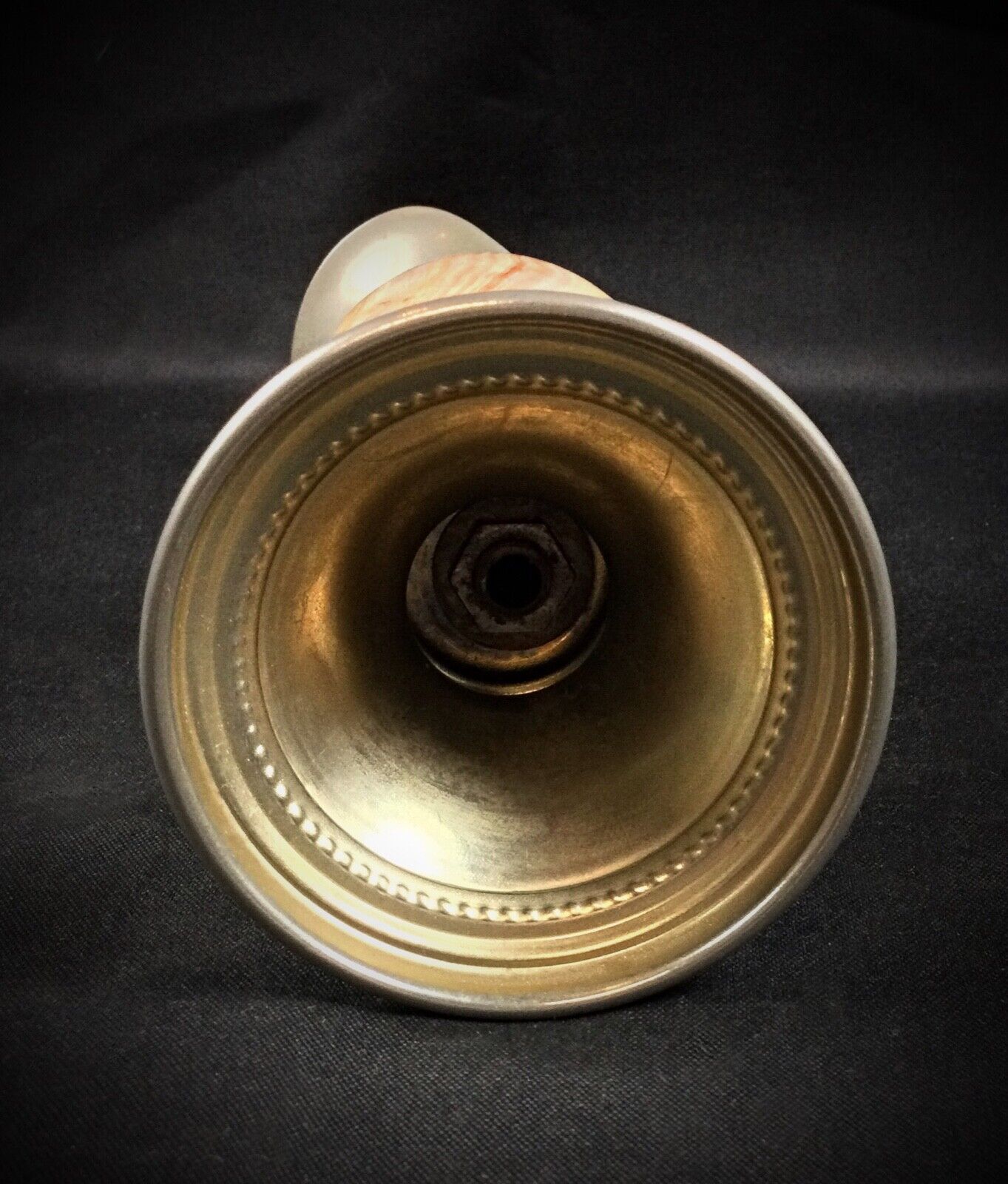 Unique stone jug vase with intricate marbled patterns and pewter elements