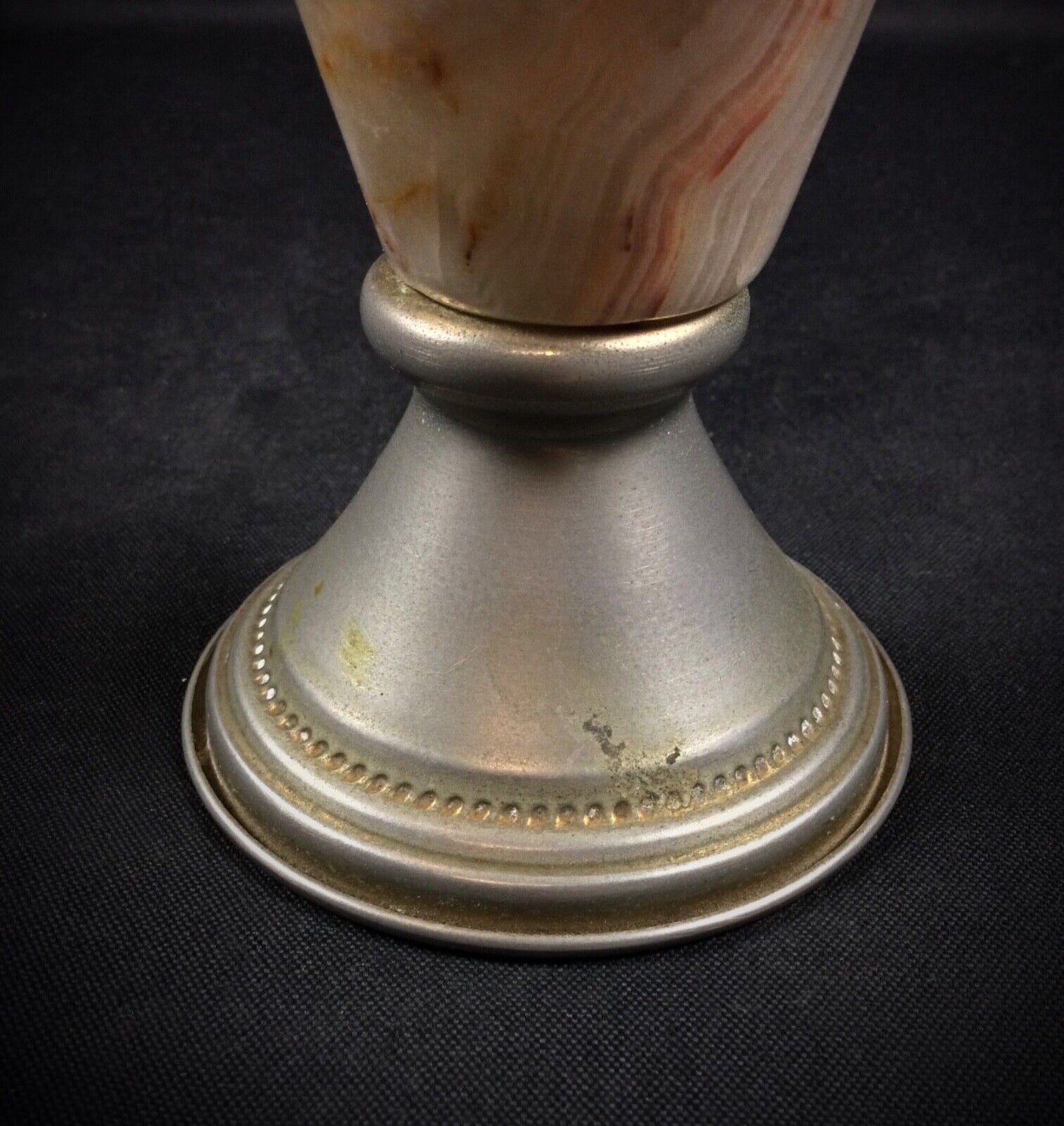 Top view of a small onyx and pewter jug vase, showcasing craftsmanship