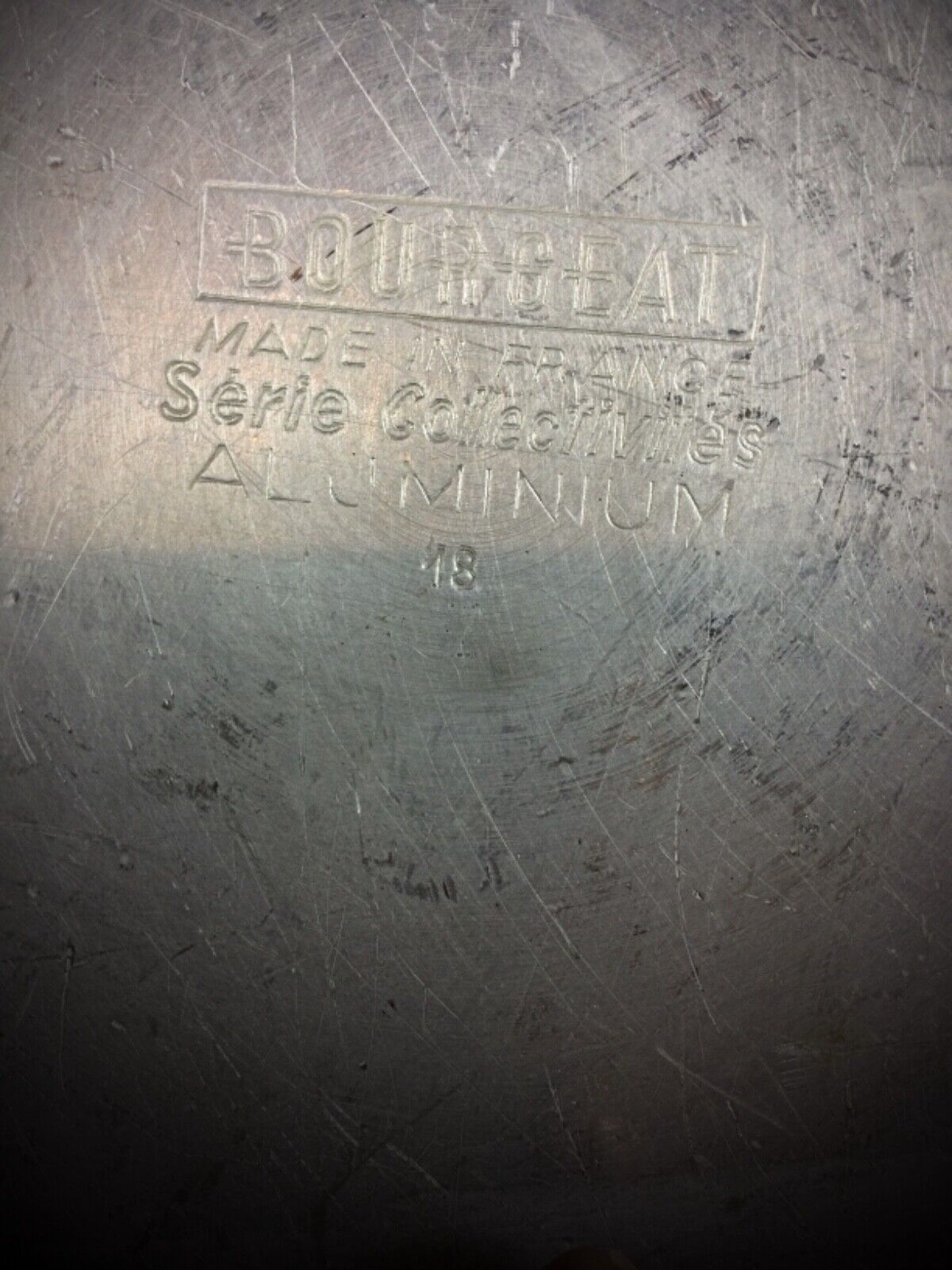 Underside view of the Bourgeat saucepan with visible wear marks