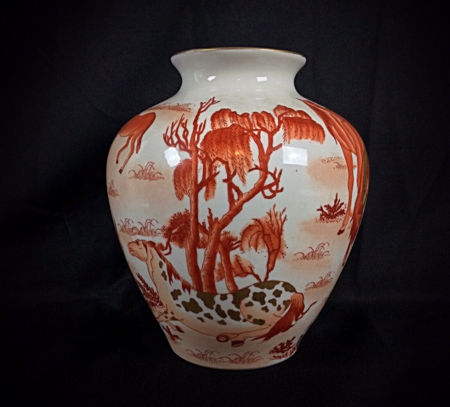 Close-up of intricate hand-painted floral designs on Chinese vase